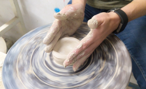 person-making-pottery